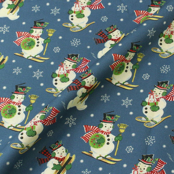 輸入プリント生地 ブルー地 クリスマス遊ぶスノーマン 巾110cm×1mカット販売 10370-peacock（直送品）