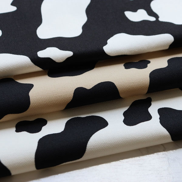 日本紐釦貿易 ツイル生地 牛柄 color.B 巾約112cm 1mカット IBK7070 
