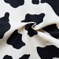 日本紐釦貿易 ツイル生地　牛柄　color.A　巾約112cm　1mカット　IBK7070-11A-1M（直送品）