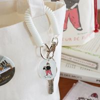 （世界の名作）コイルキーホルダー 笛を吹く少年 LAKOLE/ラコレ