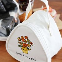 （世界の名作）おにぎりポーチ ひまわり LAKOLE/ラコレ