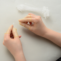 プラス　アメ色指サック　L　1パック（10個入）　35948