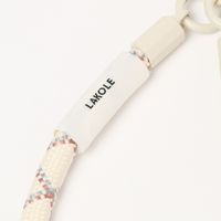 スマホハンドストラップ クロス×アイボリー LAKOLE/ラコレ
