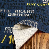 日本紐釦貿易(Nippon Chuko) キャンバス生地 CRAFT VILLAGE テキスト カーキ 巾約110cm×5mカット IBK9（直送品）