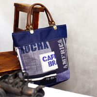 日本紐釦貿易(Nippon Chuko) キャンバス生地 CRAFT VILLAGE パッチワーク風 ブラック系 巾約110cm×8mカット（直送品）